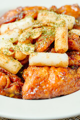 yangnyeom chicken, Korean Seasoned Fried Chicken : This dish is seasoned chicken cut into pieces, deep- fried, and mixed with soy sauce, gochujang, or other sauces. It has a mild yet spicy taste that 