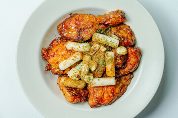 yangnyeom chicken, Korean Seasoned Fried Chicken : This dish is seasoned chicken cut into pieces, deep- fried, and mixed with soy sauce, gochujang, or other sauces. It has a mild yet spicy taste that 