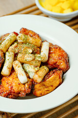 yangnyeom chicken, Korean Seasoned Fried Chicken : This dish is seasoned chicken cut into pieces, deep- fried, and mixed with soy sauce, gochujang, or other sauces. It has a mild yet spicy taste that 