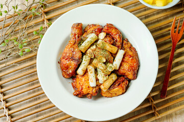 yangnyeom chicken, Korean Seasoned Fried Chicken : This dish is seasoned chicken cut into pieces, deep- fried, and mixed with soy sauce, gochujang, or other sauces. It has a mild yet spicy taste that 