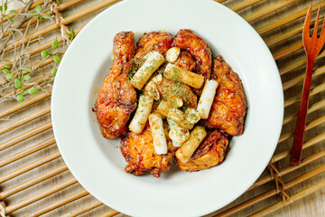yangnyeom chicken, Korean Seasoned Fried Chicken : This dish is seasoned chicken cut into pieces, deep- fried, and mixed with soy sauce, gochujang, or other sauces. It has a mild yet spicy taste that 