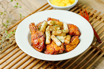 yangnyeom chicken, Korean Seasoned Fried Chicken : This dish is seasoned chicken cut into pieces, deep- fried, and mixed with soy sauce, gochujang, or other sauces. It has a mild yet spicy taste that 