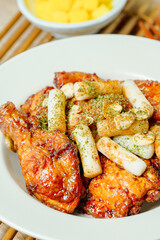 yangnyeom chicken, Korean Seasoned Fried Chicken : This dish is seasoned chicken cut into pieces, deep- fried, and mixed with soy sauce, gochujang, or other sauces. It has a mild yet spicy taste that 