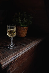 A glass with a drink in the shade