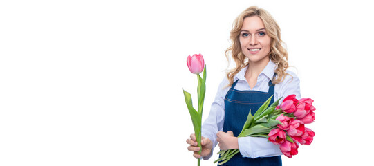 glad young woman in apron with spring tulip flowers isolated on white background, Woman isolated face portrait, banner with mock up copy space.