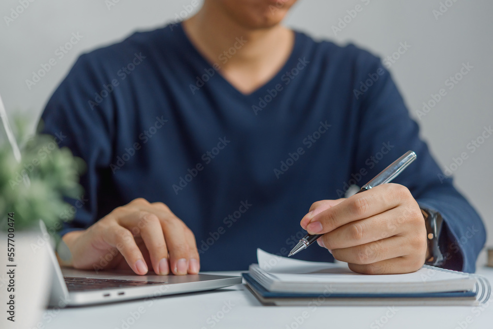 Poster learning online class by using laptop computer and writing notebook at workplace, education developm