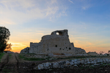 Obraz premium The walls of the castle ruins Kula Turnina near Rovij in Istria backlit at sunset