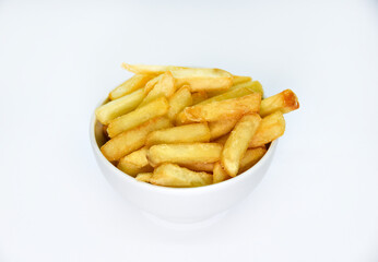 Yellow delicious French fries in white dishes. Fast food on a plate. Fried potatoes. Toasted potato slices on a white background.