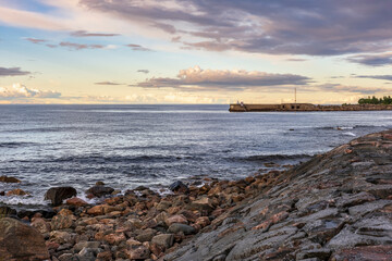 The Swedish Baltic Sea with a pier during the autumn sunset