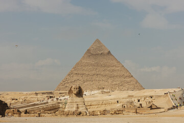 Great Sphinx of Giza in front of the Cheops pyramid