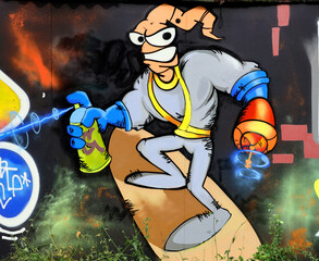 Colorful background of graffiti painting artwork with bright aerosol strips on metal wall. Old school street art piece made with aerosol spray paint cans. Contemporary youth culture backdrop