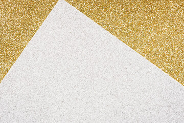 Luxury festive glitter background - abstract geometric composition in golden and silver colours with copy space for your text. Minimal fashionable style backdrop