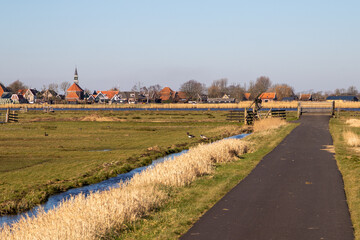 Fototapeta na wymiar landscape with country road in the netherlands