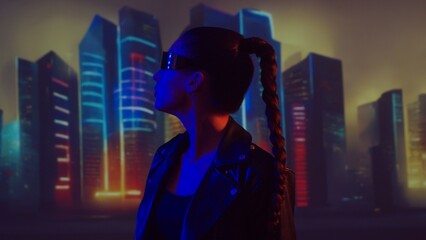 Portrait of cyberpunk girl with a smartphone. Beautiful young woman on the background of city scyscrapers. Futuristic concept.