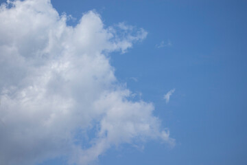 clear sky There is a big cloud on the left side of the picture.