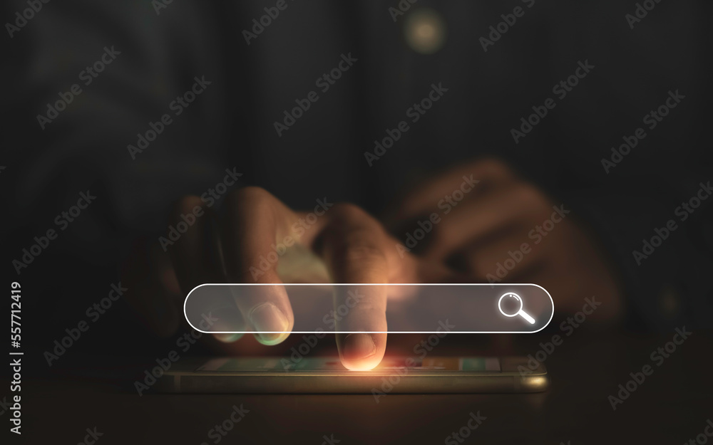 Poster hand touching to smartphone with search icon for search engine optimisation or seo concept to find i
