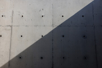 light and shadow on bare concrete background.