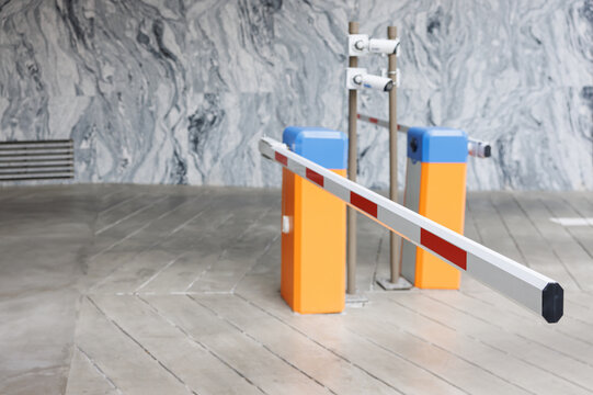 car park barrier with recoding CCTV camera, automatic entry system.