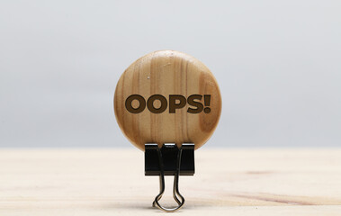 Motivational and inspirational quote wrote on wood. Oops