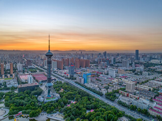 Obraz premium Aerial shot of Shijiazhuang TV Tower, Century Park and Golf Club, Shijiazhuang City, Hebei Province, China