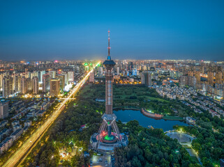 Obraz premium Aerial shot of Shijiazhuang TV Tower, Century Park and Golf Club, Shijiazhuang City, Hebei Province, China