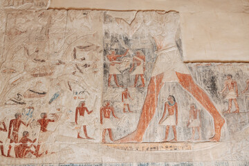 Ancient Egyptian fresco in a tomb at the Saqqara Necropolis.