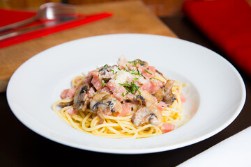 Carbonara pasta. Carbonara is an Italian pasta dish from Rome made with eggs, hard cheese, cured pork, and black pepper.