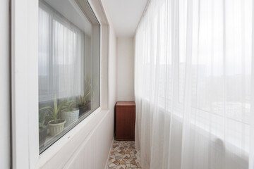 interior decoration of the interior of the balcony of a residential apartment. view from the balcony.