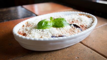 Parmigiana. It's like a lasagna made of aubergines, with grated cheese, tomato sauce and basil leaves.