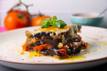 Parmigiana. It's like a lasagna made of aubergines, with grated cheese, tomato sauce and basil leaves.