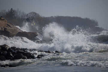 Ocean waves crashing on a rocky shore