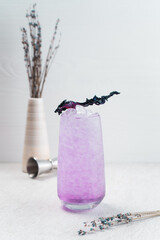 Glass of fresh cocktail with lavender