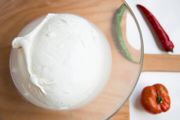 Mozzarella is a southern Italian cheese traditionally made from Italian buffalo milk using the pasta hilada method.