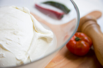 Mozzarella is a southern Italian cheese traditionally made from Italian buffalo milk using the pasta hilada method.