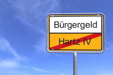 Ortsschild - Ortstafel - B&uuml;rgergeld - Hartz IV - Himmel - Wolken