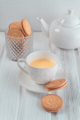 teapot and cup with hot alcoholic drink