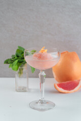 Glass with ice cream and pink champagne. Delicious drinks concept.