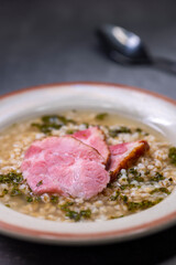 broth with smoked meat and groats