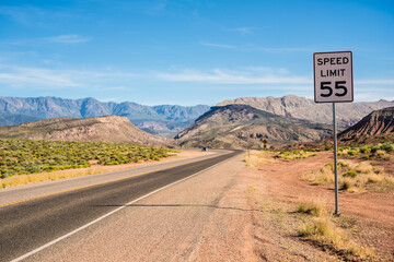 Speed limit 55 sign in Death Valley, USA - obrazy, fototapety, plakaty