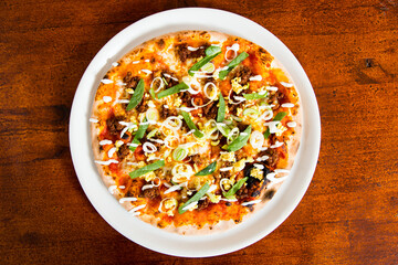 Pizza with meat and vegetables curry. Neapolitan pizza made with mozzarella. Italian recipe.