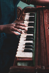 musician playing the piano