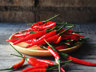 still life red hot chilli on wooden table spice