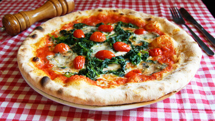 Pizza with vegetables. Neapolitan pizza made with baked vegetables. Italian vegetarian recipe.