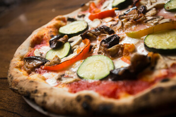 Pizza with vegetables. Neapolitan pizza made with baked vegetables. Italian vegetarian recipe.