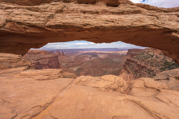 hiking to mesa arch in the island in the sky in canyonlands national park, usa