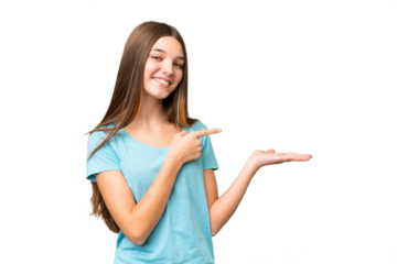 Teenager girl over isolated chroma key background holding copyspace imaginary on the palm to insert an ad