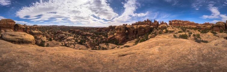 hiking the chesler park loop trail in the needles in canyonlands national park, usa