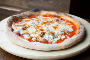 Tuna Pizza. Neapolitan pizza with mozzarella cheese, tuna, onion and olives. Authentic Italian...