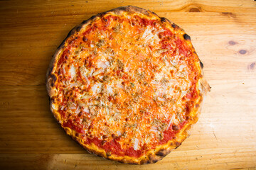 Tuna Pizza. Neapolitan pizza with mozzarella cheese, tuna, onion and olives. Authentic Italian recipe.