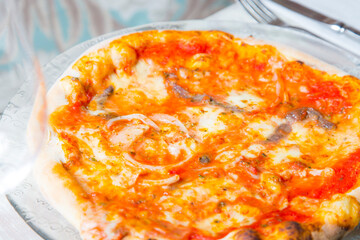 Anchovy Pizza. Neapolitan pizza with mozzarella cheese and anchovies from the Mediterranean Sea. Authentic Italian recipe.